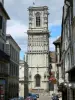 Clamecy - Tower of the Saint-Martin collegiate church and facades of houses in the old town