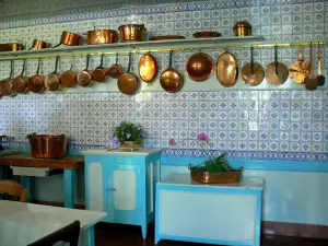 Claude Monet’s house and gardens - Inside Monet's house, in Giverny: kitchen with blue tiles and copper utensils