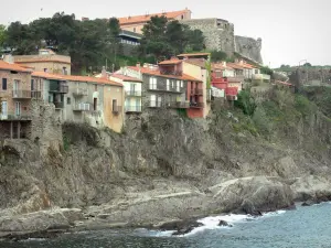 Collioure - Miradou fort and facades of houses overlooking the Mediterranean sea