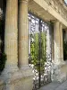 Condom - Portal with columns and wrought iron gate of the Polignac mansion (school)