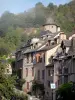 Conques - Facades of houses, half-timbered mansion of the Tourist Office of Conques