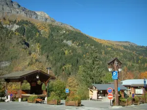 Les Contamines-Montjoie - Place of the village (ski resort) and the forest in autumn