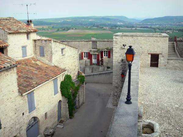 Dauphin - Terrace of the ancient castle and its panoramic view of the surrounding landscapes, street and houses of the Provençal village