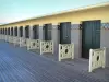 Deauville - Côte Fleurie (Flower coast): beach huts on the Planches boardwalk