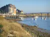 Dives estuary - The River Dives with boats, bridge and residences of the Cabourg seaside resort