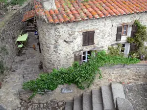 Eus - Stairway and stone house of the village