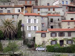 Eus - Facades of houses in the village