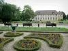 Évreux - Old Capucins' convent, public garden (Parc François Mitterrand) with benches and flowerbeds