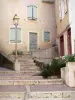 Foix - Stairs, lamppost and house facades of the old town