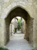 Fourcès - Gate (passage) of the Clock tower