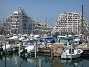 La Grande-Motte - Seaside resort: pyramid-shaped buildings, boats and sailboats of the sailing port