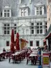 Grenoble - Facade of the former Palace of the Dauphiné Parliament (former courthouse) of Renaissance style and café terrace in the Place Saint-André square