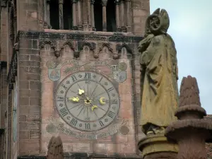Guebwiller - Clock of the Saint-Léger church and statue