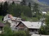 Guillestre - Houses of the city, trees and mountain