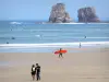 Hendaye - Deux Jumeaux rocks, Atlantic Ocean, beach, surfers and walkers; in the Basque Country