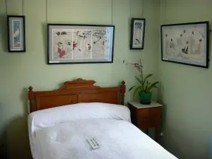 Huis en tuinen van Claude Monet - In het huis van Monet in Giverny: Alice's kamer ingericht met Japanse prenten