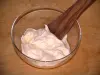 Isigny dairy products - Cream in a glass jar and a wooden spoon