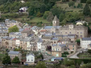 Landscapes of Aveyron - View of the village of Saint-Beauzély, with its church bell tower, its castle and its houses