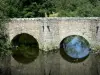 Landscapes of the Deux-Sèvres - Thouet valley: Romanesque bridge of Gourgé reflected in the waters of River Thouet