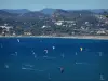 Landscapes of the French Riviera coast - The Mediterranean Sea, kitesurfs, windsurfing boards, coast and hills