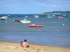 Landscapes of the Gironde - Beach of Cap-Ferret with a view of the boats floating on the Arcachon bay