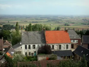 Landscapes of the Nord - From the Cassel mountain, view of the roofs of the houses of the Cassel city, trees and the Flanders plain