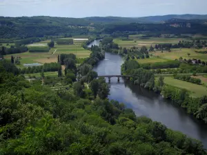 Landscapes of Périgord - Dordogne valley: trees, bridge spanning the River Dordogne, fields and hills