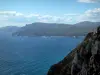 Landscapes of the Provence coast - From the scenic Crete coastal road, view of a cliff, the Mediterranean sea and the coast in background