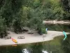 Landscapes of the Tarn-et-Garonne - Aveyron gorges: River Aveyron, trees along the water and bank with picnic tables 