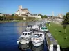 Landscapes of the Yonne - Auxerre: moored boats, Yonne river and Saint-Étienne cathedral dominating the whole