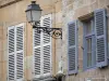 Langres - Wall lantern and facades of houses in the old town