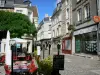 Laon - Cafe terrace and facades of houses in the medieval town