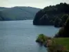 Laouzas lake - Lake and hills covered with trees (forests) in the Upper Languedoc Regional Nature Park