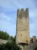 Larressingle - Crenellated tower of the fortified medieval village 