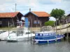 Larros port - Moored boats and huts in the oyster port 