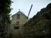 Lautrec - Stair lined with stone walls leading to the windmill