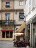 Laval - Café terrace and facades of houses in the old town