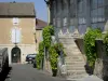 Lectoure - Corn exchange and facade of a house in the old town 