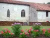 Lévignacq - Saint-Martin church and flowerbed