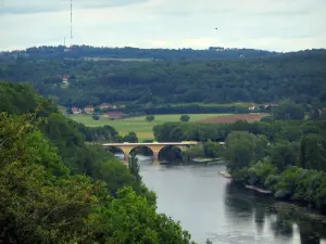Limeuil - Trees in foreground with view of the confluence of the Dordogne and the Vézère rivers, in Périgord