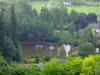 Loir valley - From the mound of the troglodyte village of Trôo, view of the Loir River, trees and houses