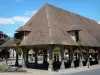 Lyons-la-Forêt - Flower-bedecked covered market hall on the Benserade square (central square)