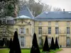 Malmaison Castle - Facade of the chateau and pruned shrubs