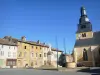 Marville - Facades of village houses, war memorial and Saint-Nicolas church