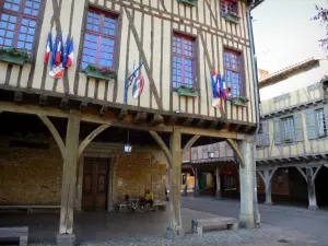 Mirepoix - Medieval bastide town: half-timbered facade of Town Hall and wooden galleries of the central square (place des couverts)