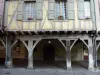 Mirepoix - Medieval bastide town: half-timbered house over a wooden gallery from the central square (place des couverts)