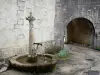 Montbenoît abbey - Fountain and arched passage