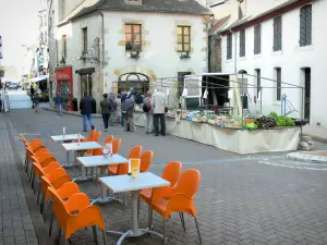 Montluçon - Café terrace, market stalls and houses of the old town