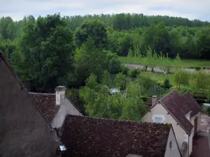 Montrésor - Houses of the village with view of the River Indrois and trees