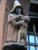 Moret-sur-Loing - Wooden statue (sculpture) on the facade of an old house